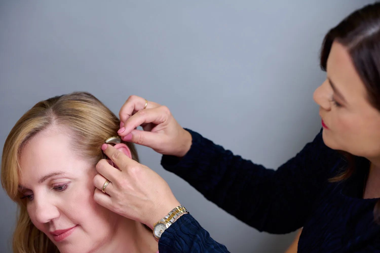 Nicole fitting a hearing device